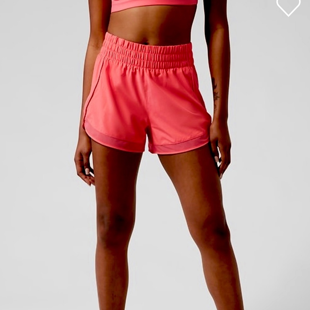 NWT Athleta Size Medium Rise Mesh Racer 3” Shorts in Coral Petal.